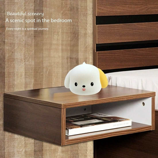 Spotted Puppy Night Light on wooden bedside table in bedroom setting