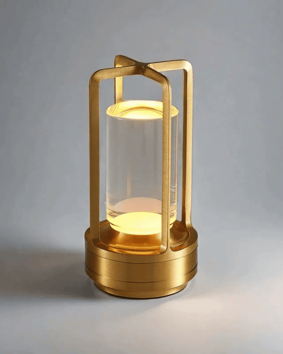 LumiHikari Crystal Lantern with faceted crystal body, gold aviation-grade aluminum frame, soft glowing light, cordless USB-C rechargeable, minimalist Japanese-inspired design.