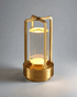 LumiHikari Crystal Lantern with faceted crystal body, gold aviation-grade aluminum frame, soft glowing light, cordless USB-C rechargeable, minimalist Japanese-inspired design.