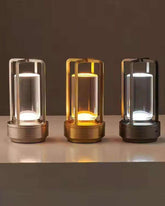 Three LumiHikari Crystal Lanterns in cool white, warm white, and neutral blend light modes on a flat surface